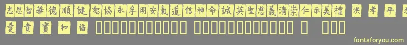 Vtmeiornamentsonblack-fontti – keltaiset fontit harmaalla taustalla