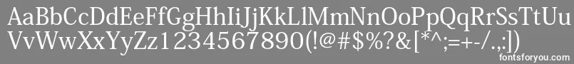 フォントKozminproMedium – 灰色の背景に白い文字