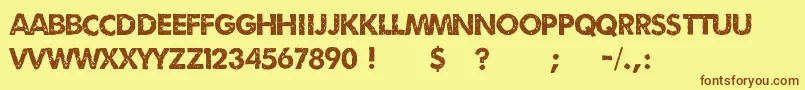 Umbrage2-Schriftart – Braune Schriften auf gelbem Hintergrund