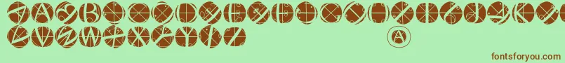 フォントRodaubuttonsinverse – 緑の背景に茶色のフォント