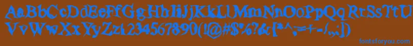 PoltergeistThick Font – Blue Fonts on Brown Background