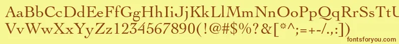 フォントCochinltstd – 茶色の文字が黄色の背景にあります。