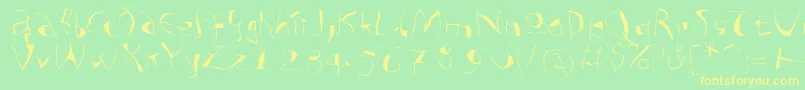 フォントAnalphabetismxtreme – 黄色の文字が緑の背景にあります