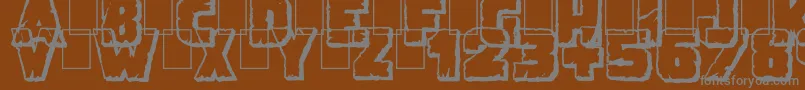 DemolitionCrackShadow Font – Gray Fonts on Brown Background