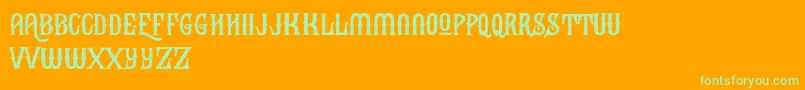 BlackHeatFree Font – Green Fonts on Orange Background