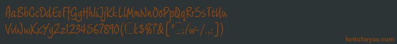 Шрифт LimehouseScriptLetPlain.1.0 – коричневые шрифты на чёрном фоне