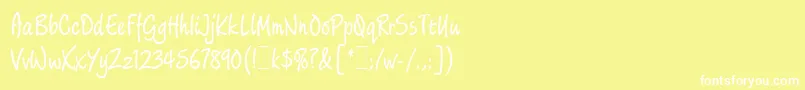 LimehouseScriptLetPlain.1.0-fontti – valkoiset fontit keltaisella taustalla
