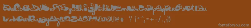 フォントGloutix1.0 – 茶色の背景に灰色の文字