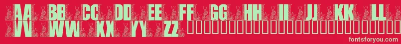 LmsEgyptianBookends-Schriftart – Grüne Schriften auf rotem Hintergrund