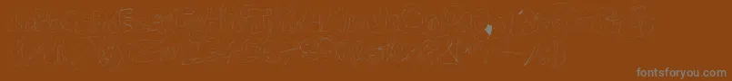 Fastype Font – Gray Fonts on Brown Background