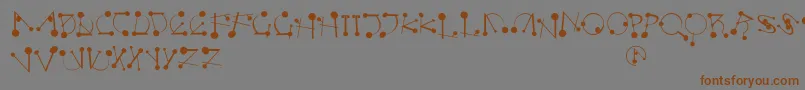 Strokesnbullets Font – Brown Fonts on Gray Background