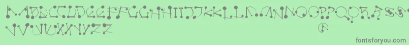 フォントStrokesnbullets – 緑の背景に灰色の文字