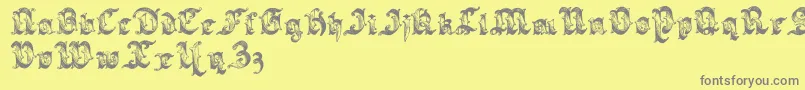 Sarabandlettering-Schriftart – Graue Schriften auf gelbem Hintergrund