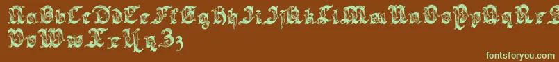 Sarabandlettering-Schriftart – Grüne Schriften auf braunem Hintergrund