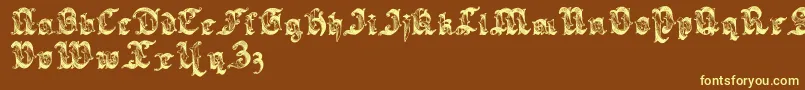 Sarabandlettering-fontti – keltaiset fontit ruskealla taustalla