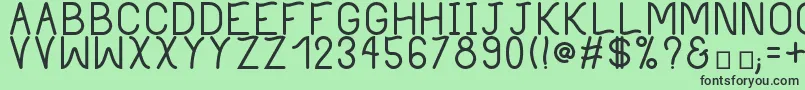 PhilippineBold-fontti – mustat fontit vihreällä taustalla
