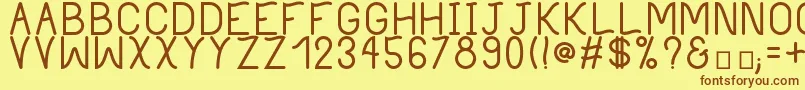 PhilippineBold-fontti – ruskeat fontit keltaisella taustalla