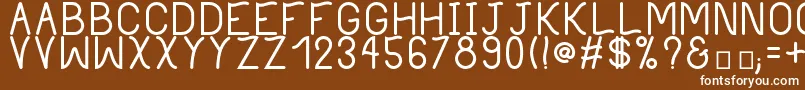 PhilippineBold-fontti – valkoiset fontit ruskealla taustalla