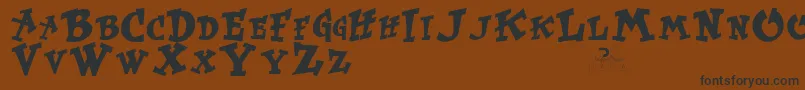 Шрифт KurtrussellRegular – чёрные шрифты на коричневом фоне