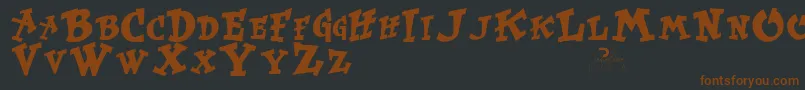 フォントKurtrussellRegular – 黒い背景に茶色のフォント