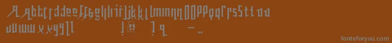 Peacetiqua Font – Gray Fonts on Brown Background