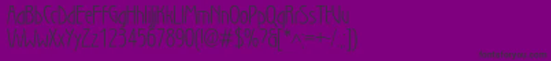 Secessionlightc-Schriftart – Schwarze Schriften auf violettem Hintergrund