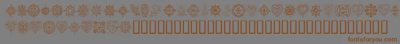 TreasuryOfDesign Font – Brown Fonts on Gray Background