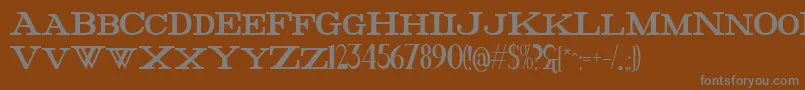 FatHighest-fontti – harmaat kirjasimet ruskealla taustalla