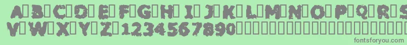 フォントBlacm – 緑の背景に灰色の文字