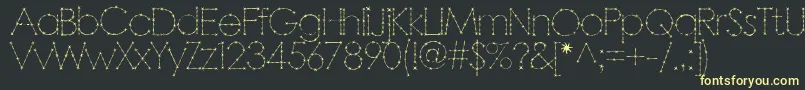 フォントBarbarello – 黒い背景に黄色の文字