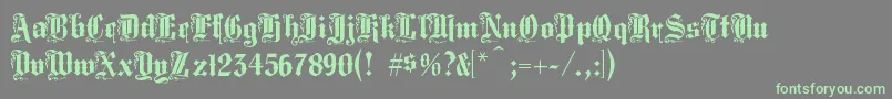 Weitere Informationen zur Middlesaxonytext-Schriftart Middlesaxonytext-Schriftart – Grüne Schriften auf grauem Hintergrund