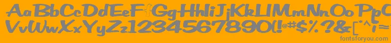 Empower42Bold-fontti – harmaat kirjasimet oranssilla taustalla