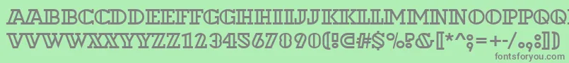 フォントDextoroutd – 緑の背景に灰色の文字