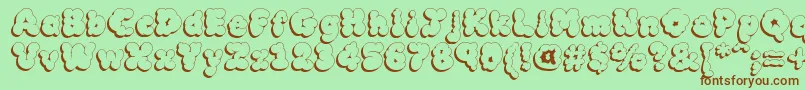 MckloudShadow Font – Brown Fonts on Green Background