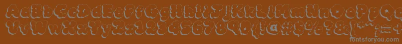 MckloudShadow Font – Gray Fonts on Brown Background