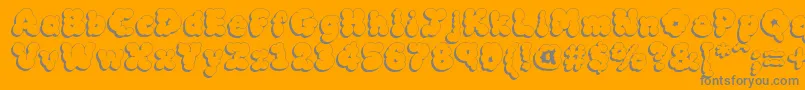 MckloudShadow-Schriftart – Graue Schriften auf orangefarbenem Hintergrund