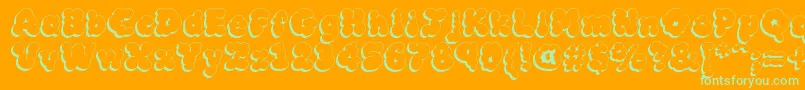 MckloudShadow-Schriftart – Grüne Schriften auf orangefarbenem Hintergrund