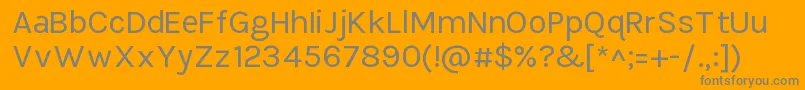 TikusputihRegular-fontti – harmaat kirjasimet oranssilla taustalla