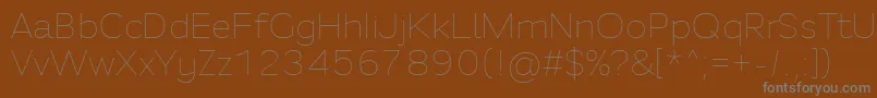 Czcionka Fortheenas01 – szare czcionki na brązowym tle