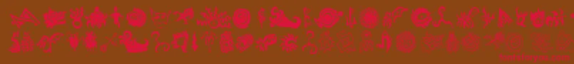 フォントCathzuluExtraz – 赤い文字が茶色の背景にあります。