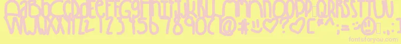 Winning-fontti – vaaleanpunaiset fontit keltaisella taustalla