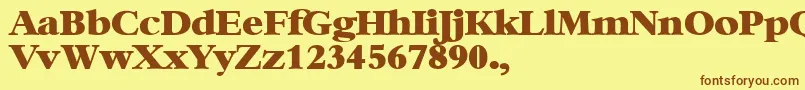 フォントXBambi – 茶色の文字が黄色の背景にあります。