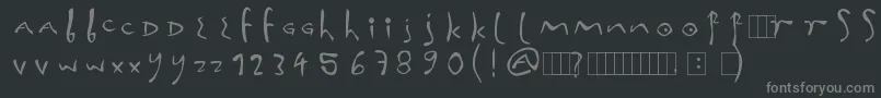 InnaFonta-fontti – harmaat kirjasimet mustalla taustalla