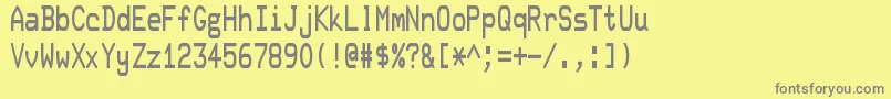 フォントDecterm – 黄色の背景に灰色の文字