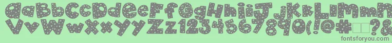 2peas4thOfJuly-fontti – harmaat kirjasimet vihreällä taustalla