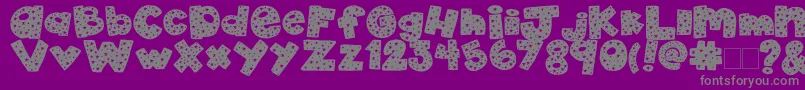 2peas4thOfJuly-fontti – harmaat kirjasimet violetilla taustalla
