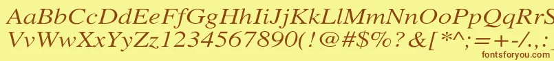 Fonte XeroxSerifWideItalic – fontes marrons em um fundo amarelo