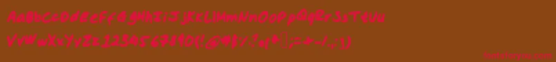 フォントHassina – 赤い文字が茶色の背景にあります。