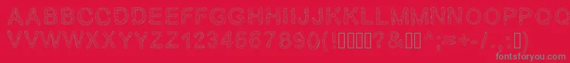 Gelstripped Font – Gray Fonts on Red Background