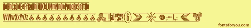 Шрифт TheTribalBoxDemoFontFfp – коричневые шрифты на жёлтом фоне